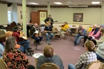 People playing musical instruments and singing at Hope Hootenanny